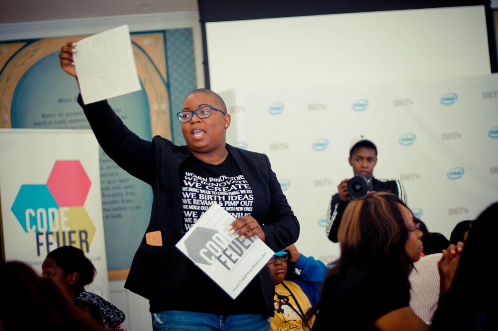 Echoing Green: a social entrepreneur speaks to the audience at a Code Fever event